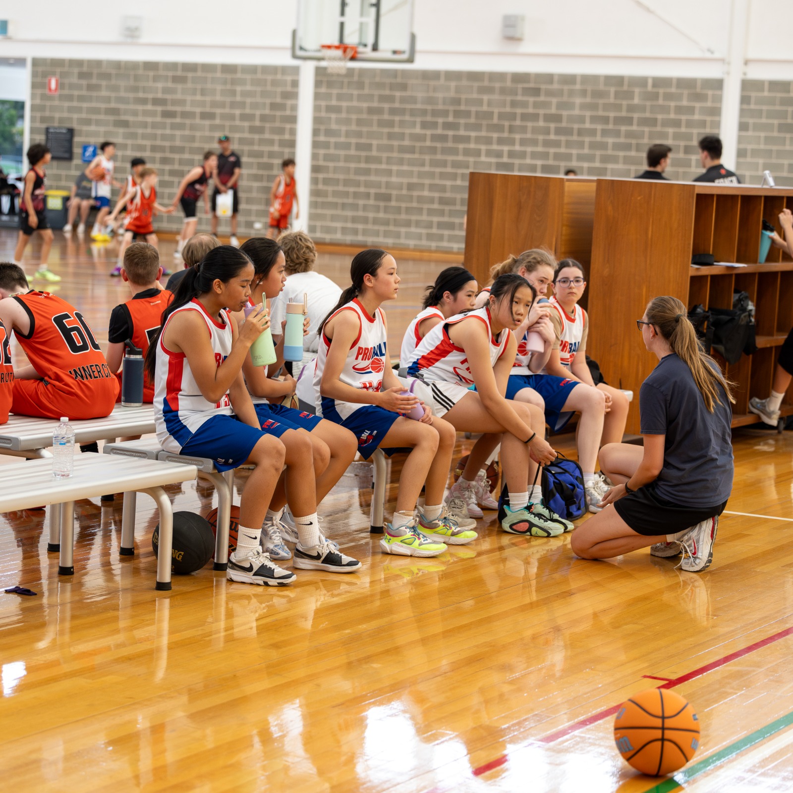 Kids participating in a beginner basketball program at Arncliffe Youth Centre, building confidence and friendships through local sport.